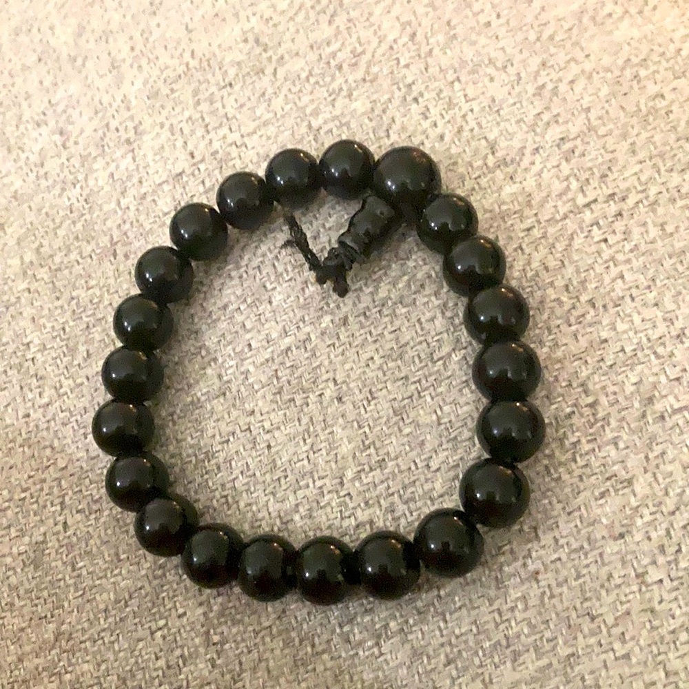 5/$25 Black glass or onyx bead stretch bracelet.